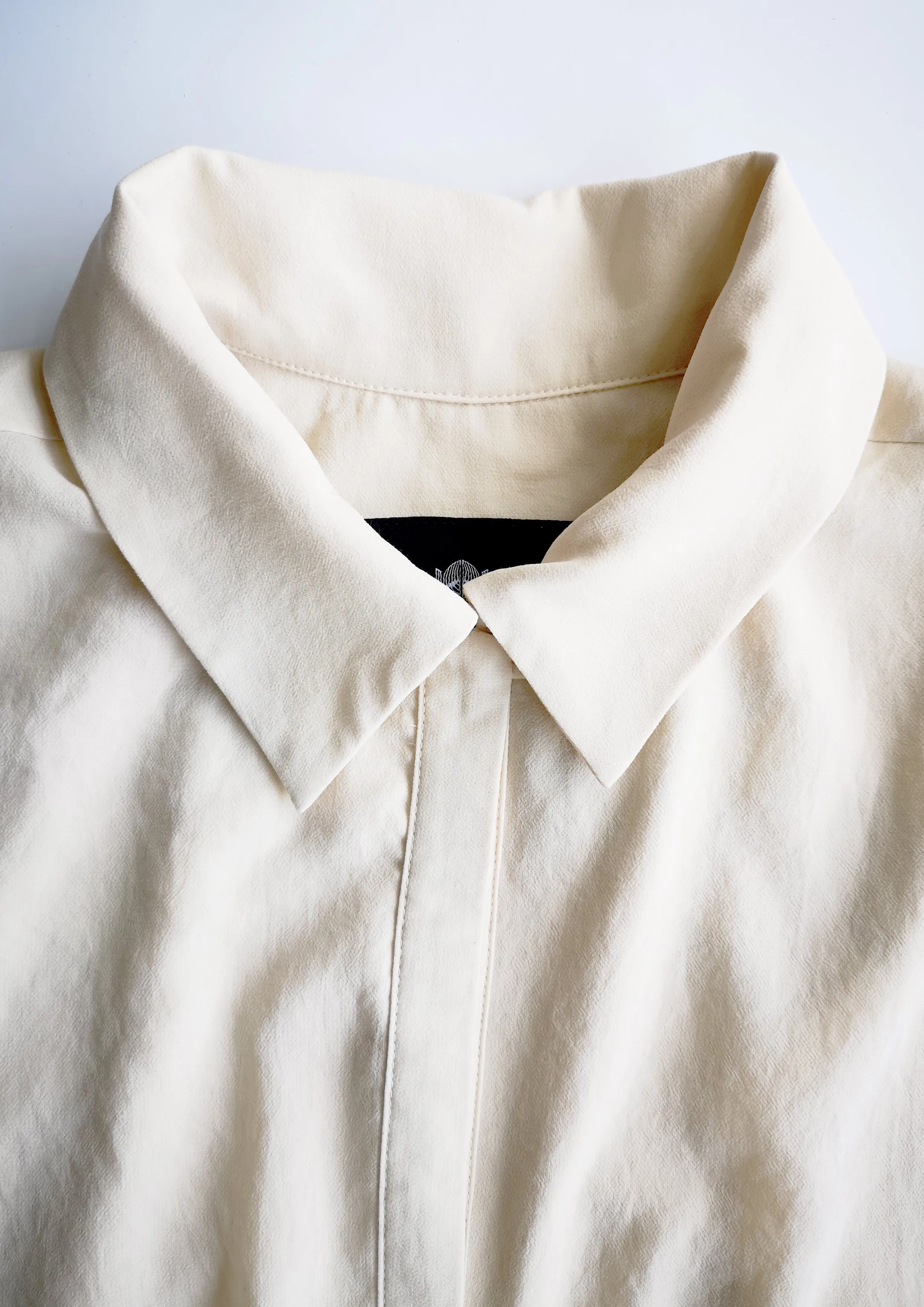 BLOUSE SLEEVELESS CREME